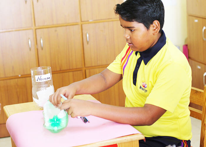 Hands-on learning in classroom garden at NewAge World School - Schools in Bangalore