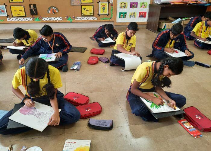 Students engaged in a creative art session at the Performing and Fine Arts Studio of NewAge World School in Yelahanka.