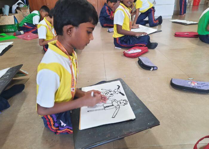 Children participating in a sketching and painting activity in the Performing and Fine Arts Studio at NewAge World School.
