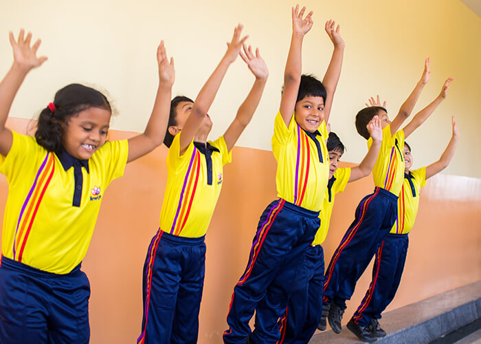 Children enjoying an interactive classroom learning session at NewAge World School