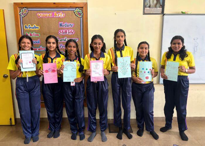 Students celebrating a festival with colorful costumes and enthusiasm