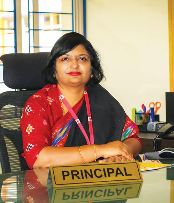 Mrs. Sujita G Nayak, Principal of NewAge World School, highlighting the school's excellence as the Best International School in Yelahanka.